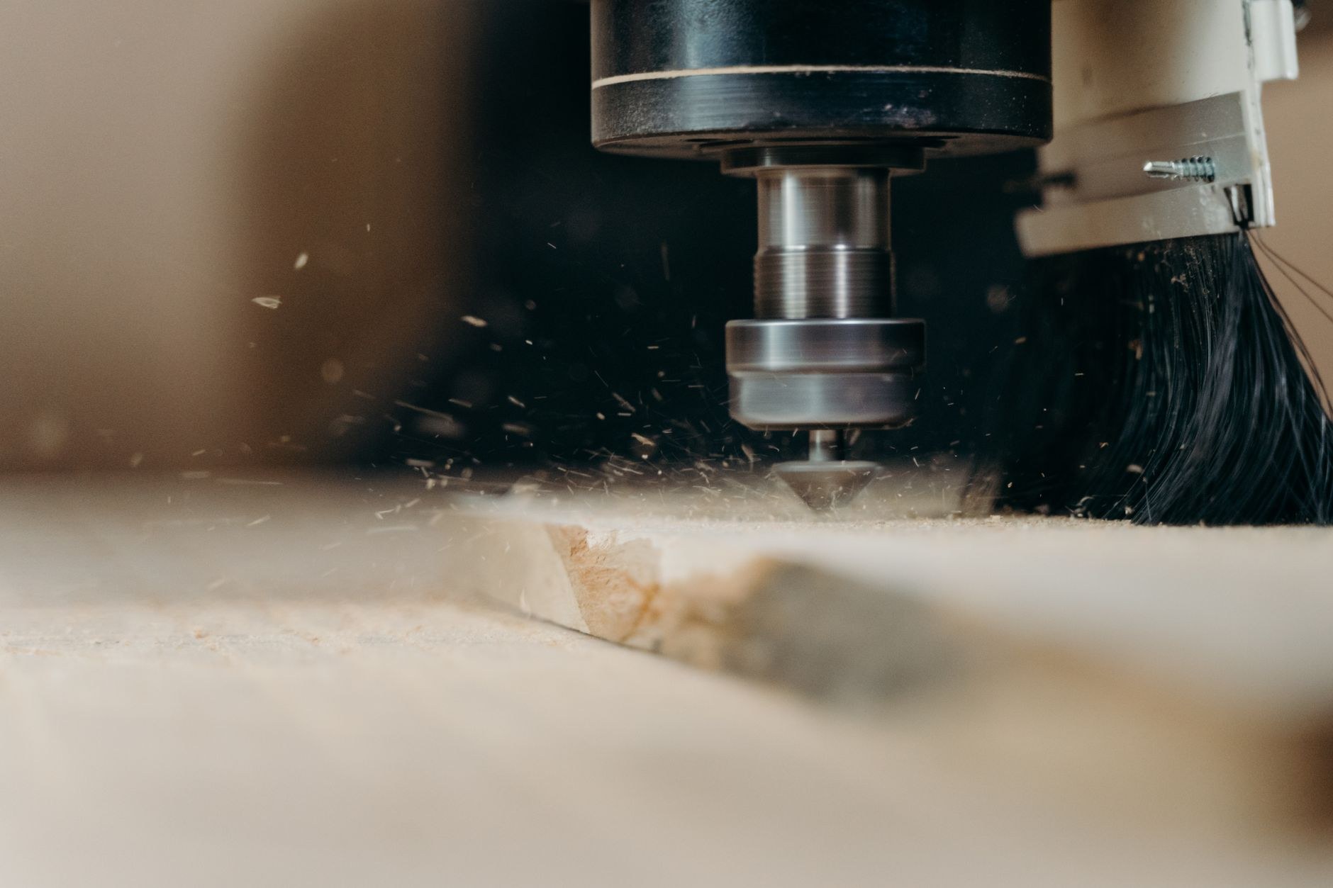 Sawdust flying as a section is cut